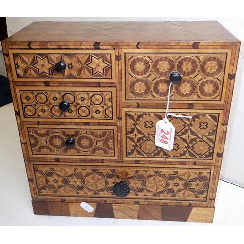 248 - An inlaid table top chest of drawers / jewellery box