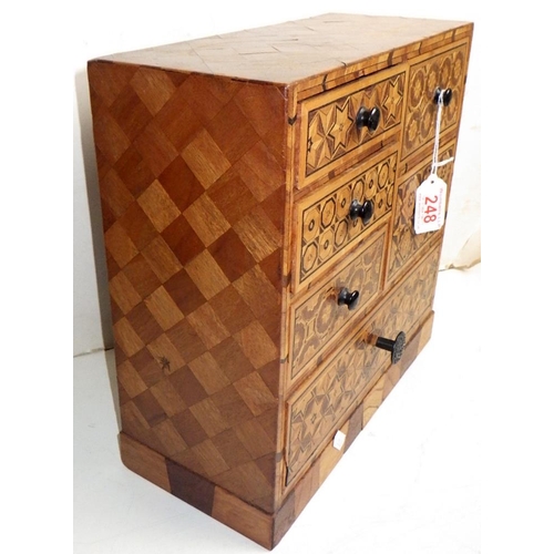 248 - An inlaid table top chest of drawers / jewellery box