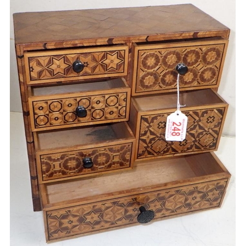 248 - An inlaid table top chest of drawers / jewellery box