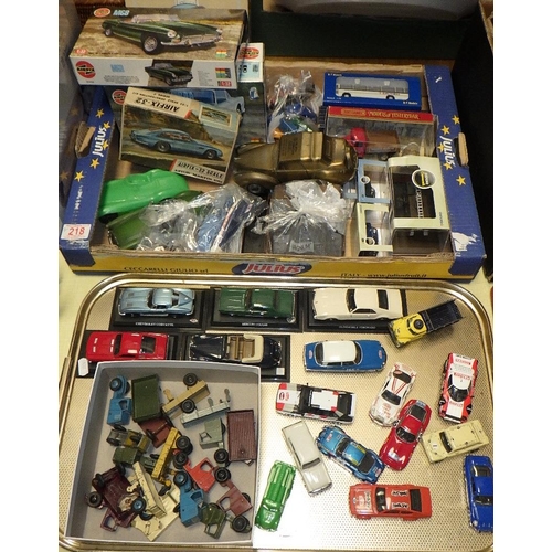 218 - A qty of die cast cars, trucks and trailers and Scalextric track (3)