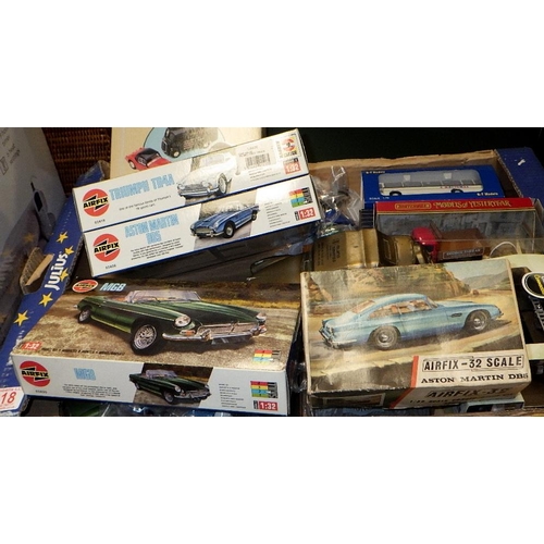 218 - A qty of die cast cars, trucks and trailers and Scalextric track (3)