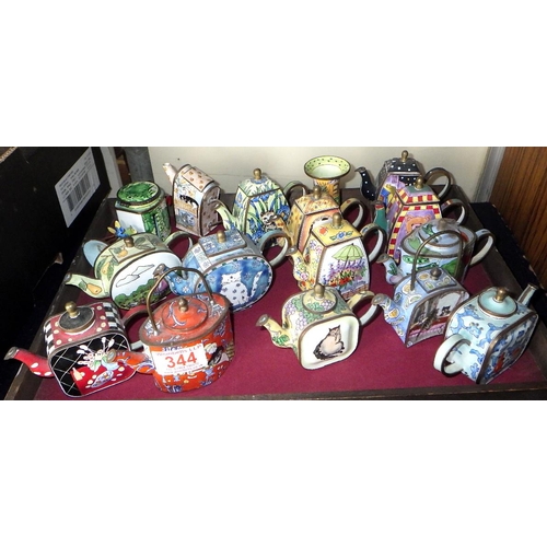 Trade + Aid enamel miniature teapots; other enamel trinkets.