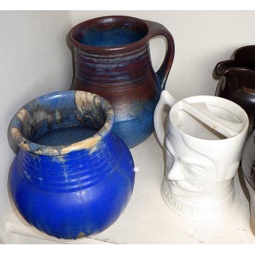 265 - An Art pottery vase JS, together with further jugs etc