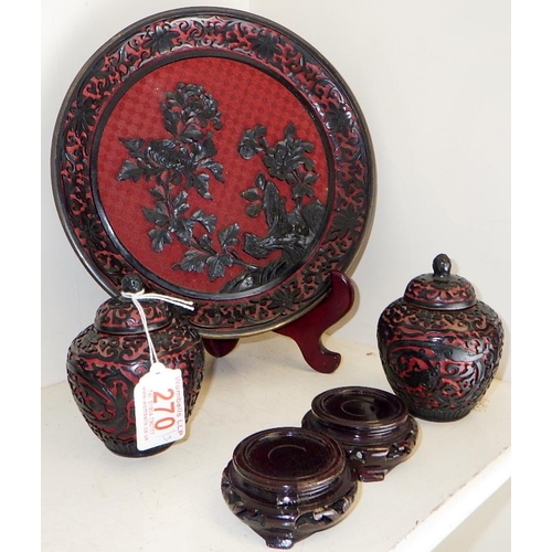 270 - A pair small of Chinese black and red cinnabar lacquered ginger jars together with a similar plate (... 