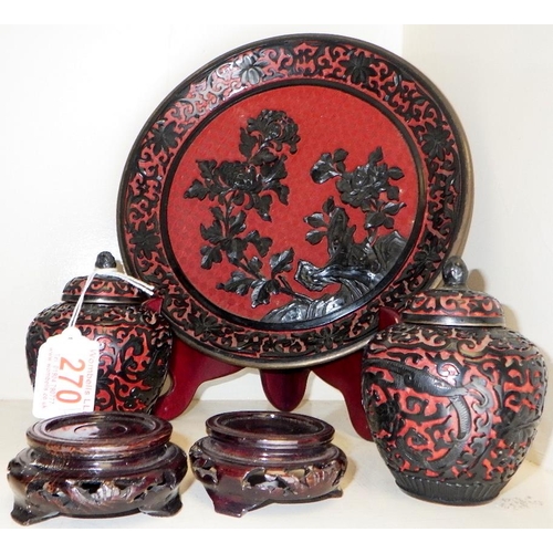 270 - A pair small of Chinese black and red cinnabar lacquered ginger jars together with a similar plate (... 