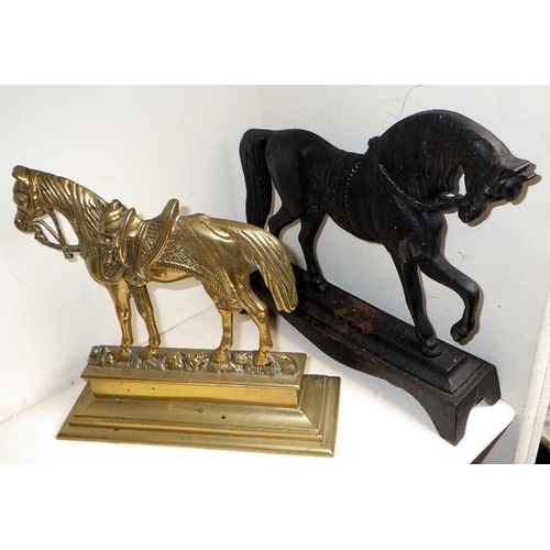 275 - A pair of well cast brass door stops together with a Punch door stop a further horse door stop and a... 