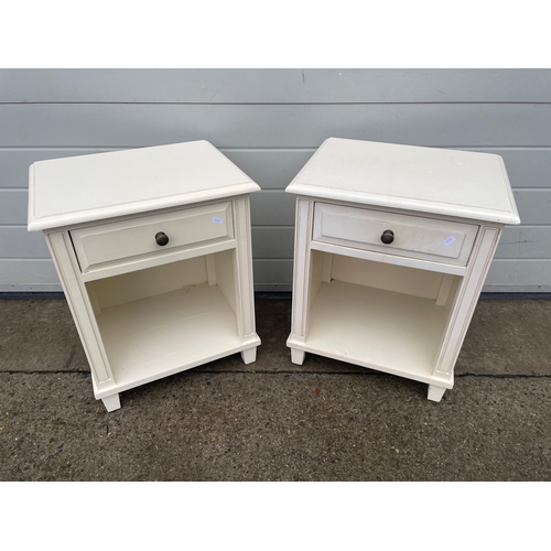 870 - A pair of white painted bedsides