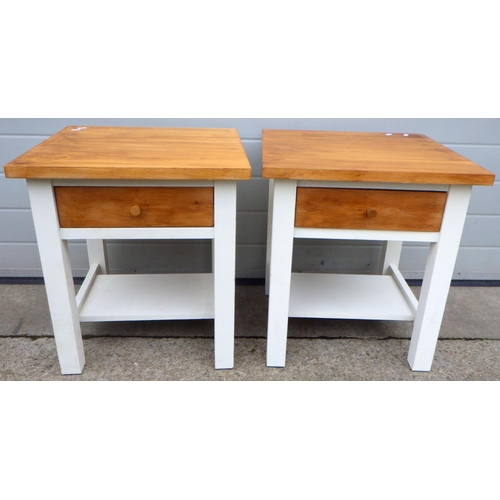 776 - A pair of modern bedside tables, white painted bases, 52cm wide