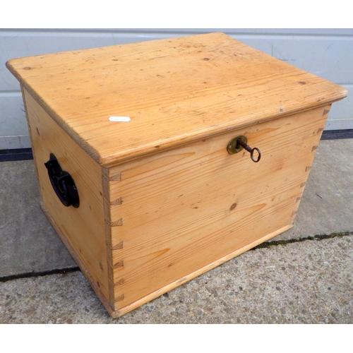 790 - A small Victorian stripped pine box, top warped, 43cm wide
