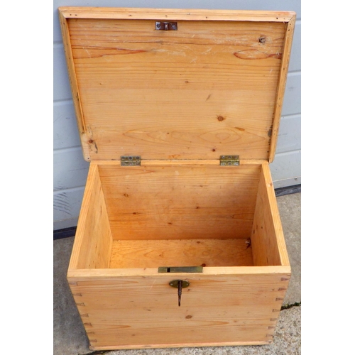 790 - A small Victorian stripped pine box, top warped, 43cm wide