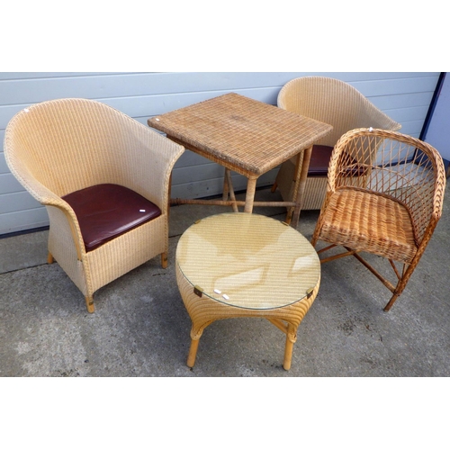 791 - A pair of Lloyd Loom style tub chairs and coffee table, another rattan table & bamboo chair (a/f) (5... 