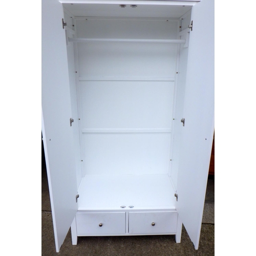 795 - A modern white double wardrobe, 100cm wide