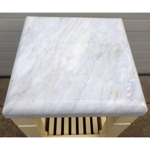 812 - A heavy marble topped kitchen work block, 65cm square, 93cm tall