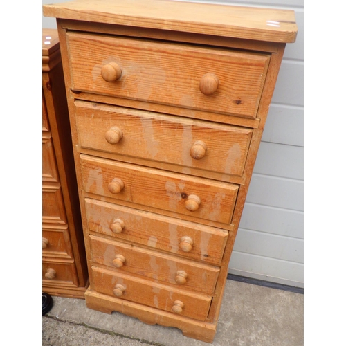 814 - A small pine chest of drawers, narrow pine cupboard, correction chair, stool pedal machine (5)