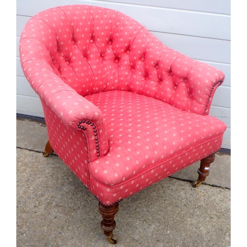819 - A Victorian button upholstered tub chair, later brass castors