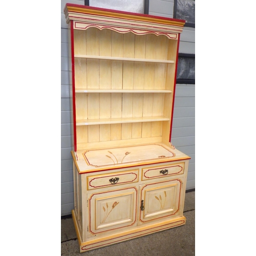 826 - A painted dresser with rack, 107cm wide