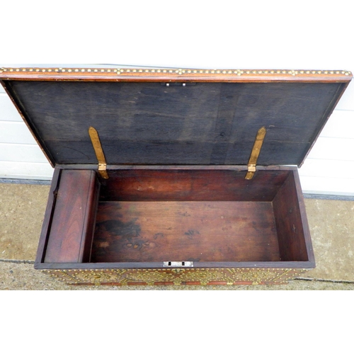 858 - A brass nailed teak blanket box, 86cm wide