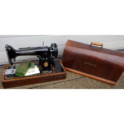 896 - A cased Singer sewing machine