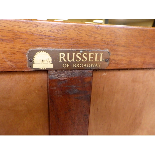 898 - A Gordon Russell Helix sideboard, faded, marks,  together with a dining table (2)