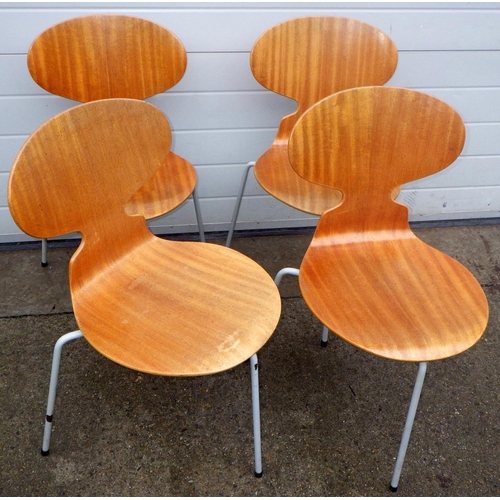 902 - A set of four three leg stacking chairs, marked F.H for Fritz Hansen, by Arne Jacobsen