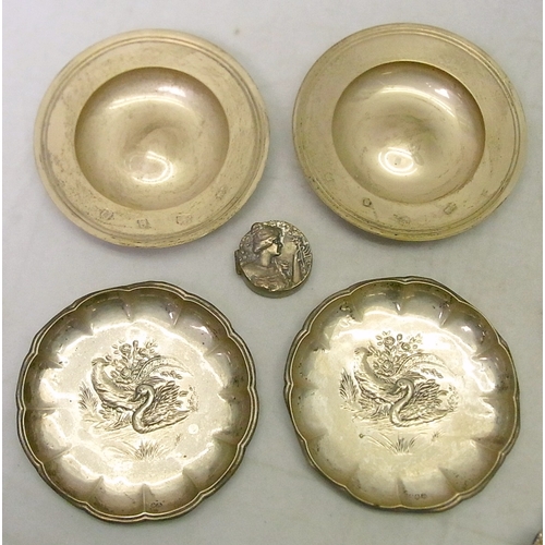19 - Two silver nut dishes, 109mm diameter; a continental glass and white metal rectangular vase; a Scand... 