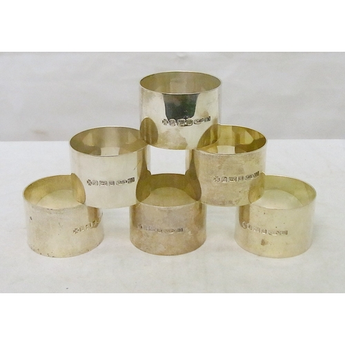 6 - A cased set of six silver napkin rings, Millennium commemoratives.