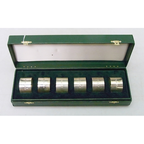 6 - A cased set of six silver napkin rings, Millennium commemoratives.