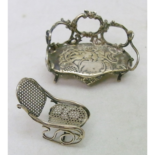 9 - Silver incl early 19th cent sugar tongs; a presentation cigarette box having a relief decorated lid;... 