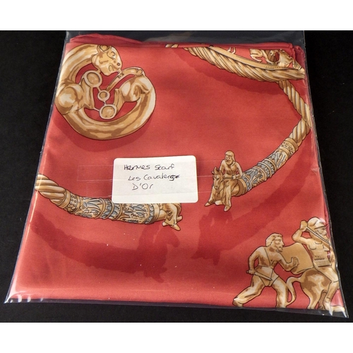 107 - A vintage Hermes scarf – “Les Cavaliers D'Or” designed by Vladimir Rybaltchenko, AKA Rybal, and was ... 