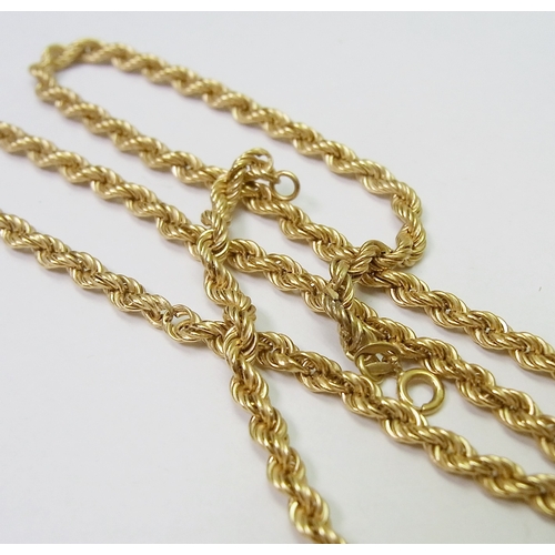 52 - An Italian rope twist neck chain, yellow metal marked 750.  710mm long