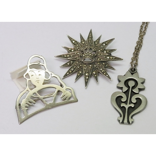 59 - A mid-century Swedish pewter pendant modelled as a flower; a star burst brooch having a coronet moti... 