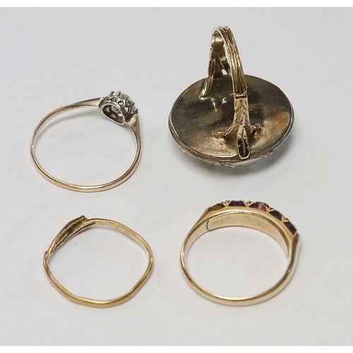 62 - A solitaire ring, yellow metal marked 9ct and paste; a yellow metal entwinned snake ring; a yellow m... 