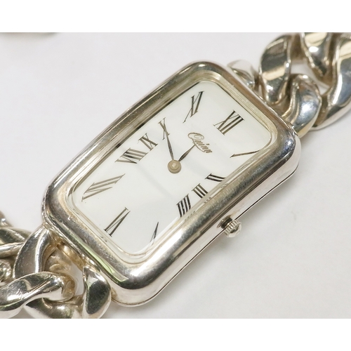 66 - A Quinn bracelet watch comprising a quartz movement beneath an enamel dial in a rectangular tonneau ... 