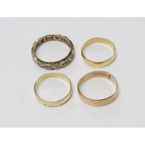 75 - Three 9ct gold band rings, 4g; a full hoop stone set ring, indistinctly marked.  (4)
