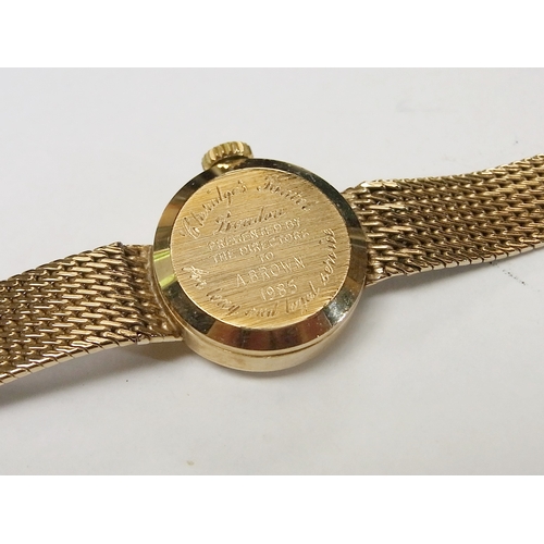 80 - A Garrard ladies quartz bracelet watch, 9ct gold bearing Claridge's Hotel presentation inscription v... 