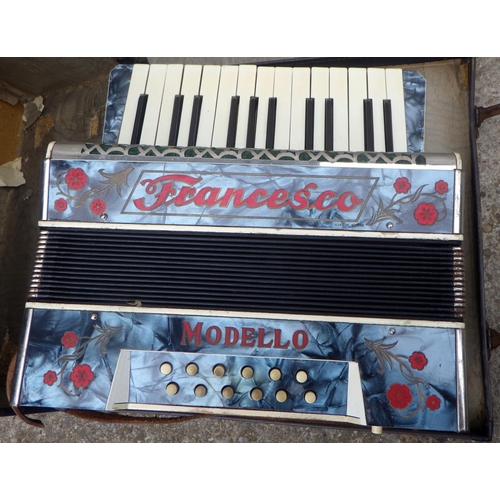 888 - A Francesco Modello piano accordian, with case