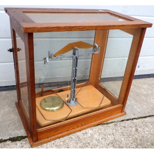 893 - A cased set of scientific balance scales
