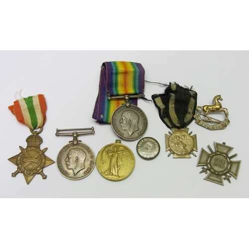 130 - A WW1 medal trio to 30424 Pte J McLaughlin Liverpool Regiment; a single WW1 British War Medal to Roy... 