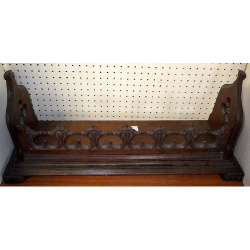 36 - A 19thC carved oak gothic book rack 57cm wide