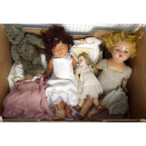 37 - A qty of vintage dolls and a bear