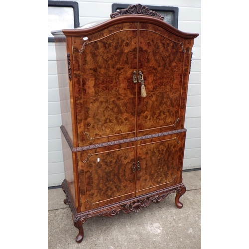 A burr walnut cocktail cabinet, 98cm wide