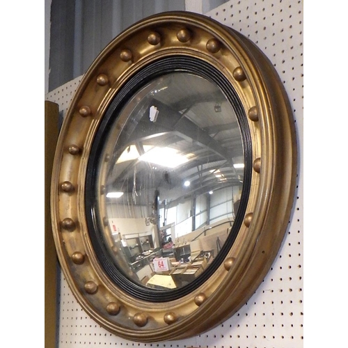 64 - A 19thC gilt framed convex mirror 64cm diameter inc frame