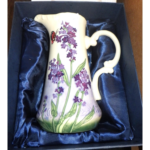 75 - A boxed Old Tupton Ware jug