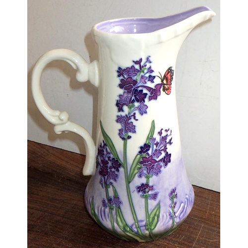 75 - A boxed Old Tupton Ware jug