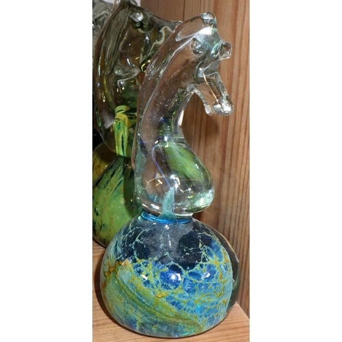 86 - A group of 8 Mdina glass seahorse paperweights