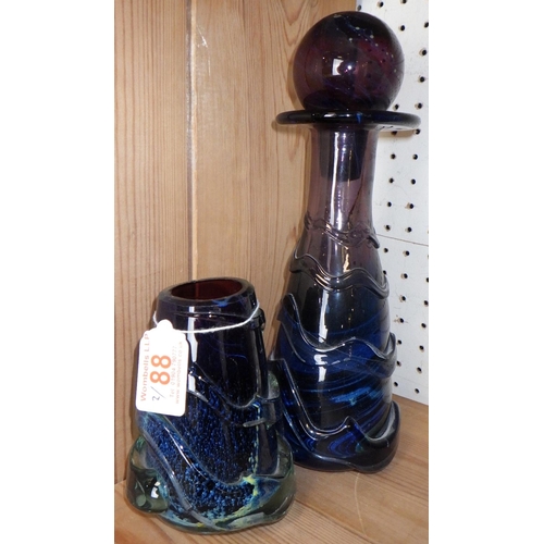 88 - A Mdina swirl decanter and vase