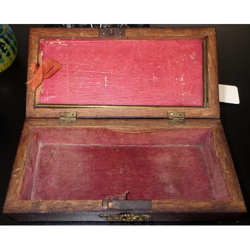 101 - A small 19thC mahogany dome top box together with a cast metal bust of a mother feeding and a small ... 