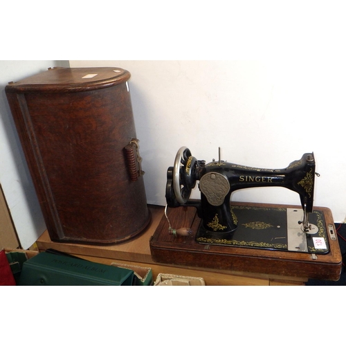 130 - A cased Singer sewing machine