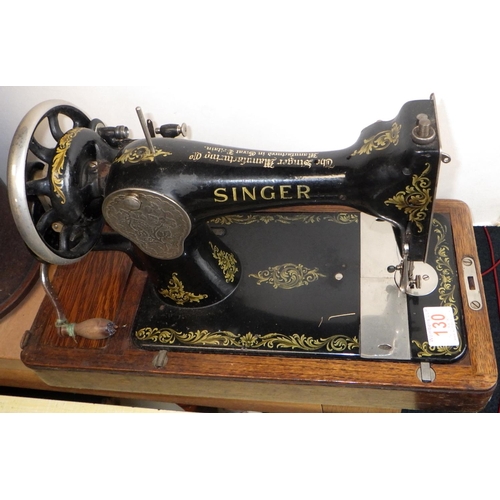 130 - A cased Singer sewing machine