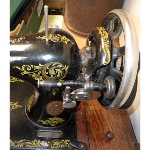 130 - A cased Singer sewing machine